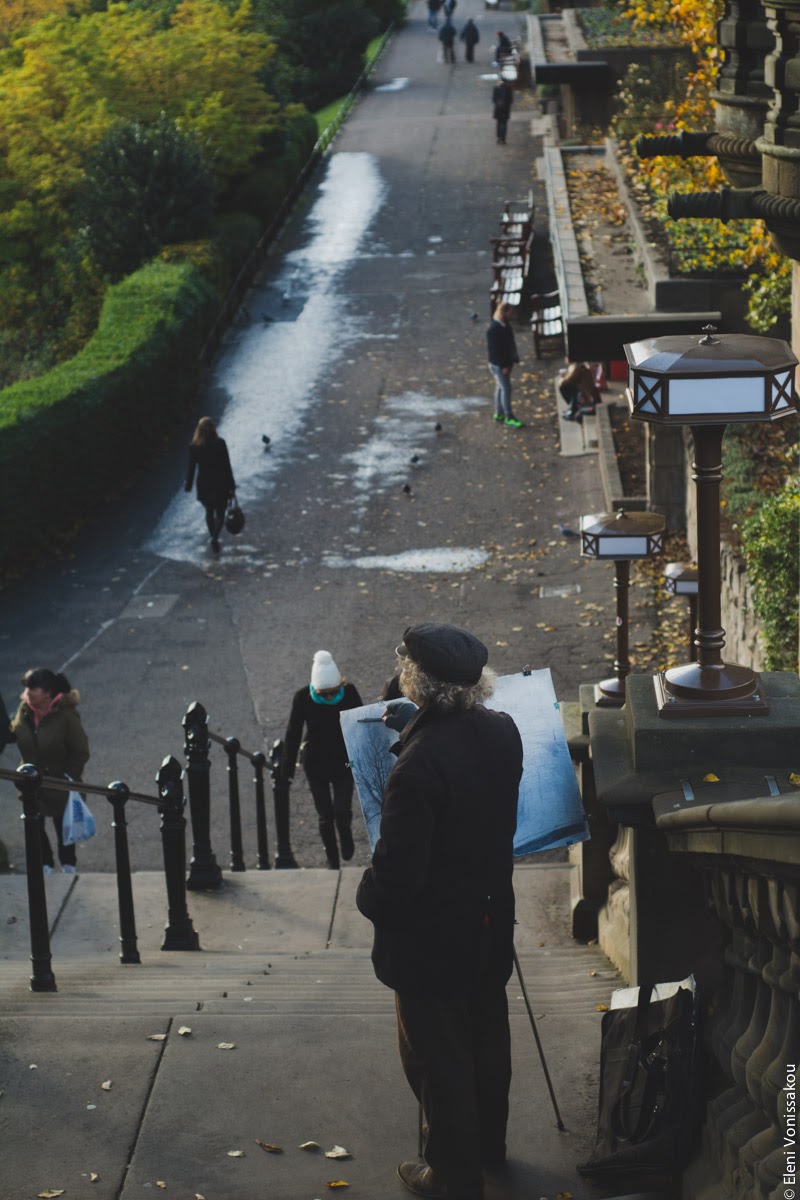 Butternut Squash Soup with Chilli and Whipped Goat’s Yoghurt Feta www.thefoodiecorner.gr Photo description: A view from above of a white haired man in a cap, standing on steps in a park with an easel, sketching his view of Edinburgh old town.