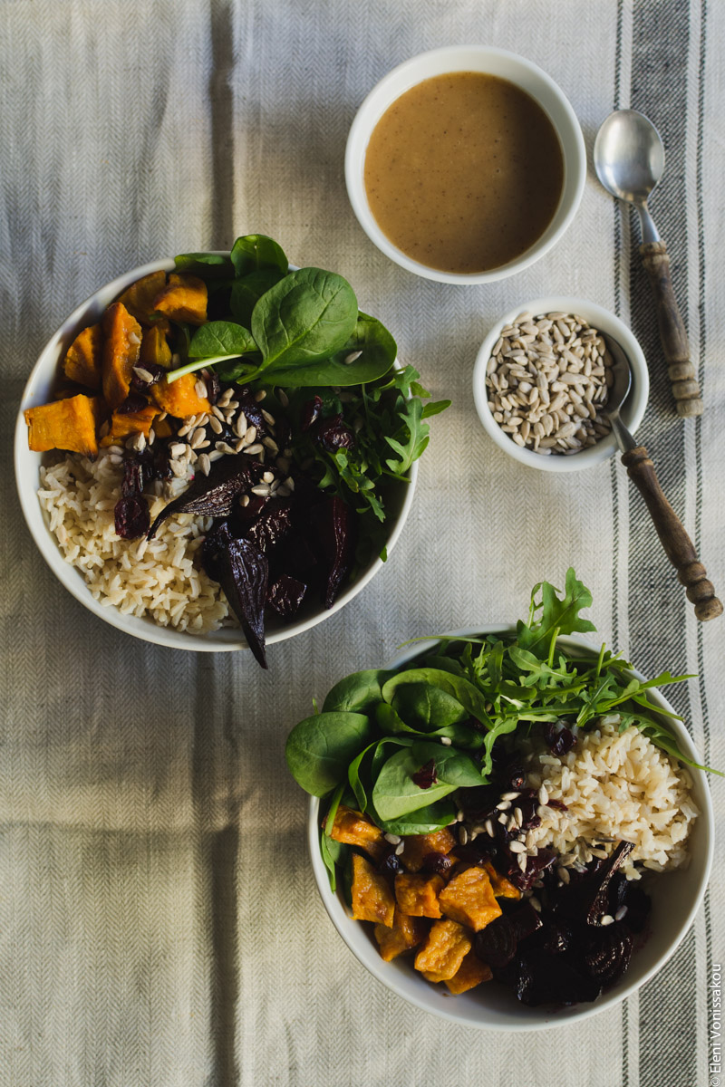 Roast Beetroot and Sweet Potato Buddha Bowl with Spicy Tahini Honey Dressing www.thefoodiecorner.gr  Photo description: The two bowls as in the main photo, but without dressing. To the top right are both small bowls with dressing and sunflower seeds.