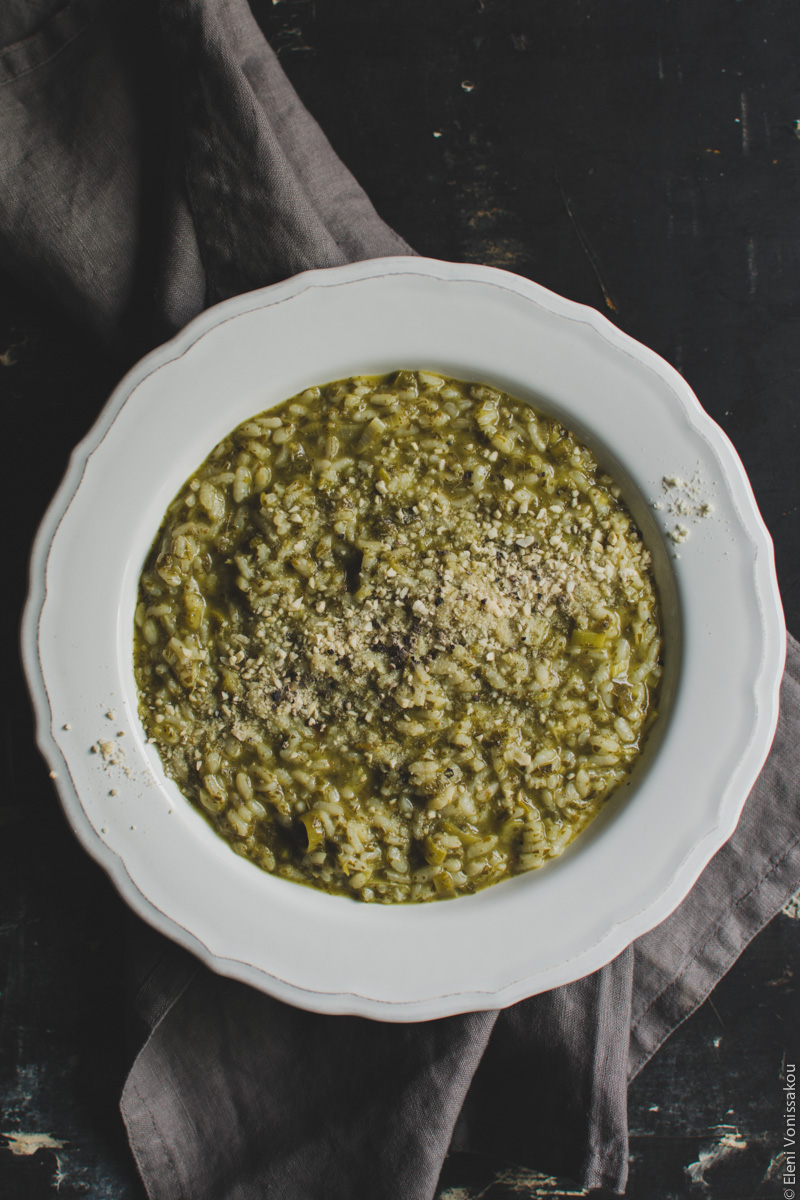 Vegan Risotto with Amaranth and Herbs www.thefoodiecorner.gr Photo description: A closer view of the plate of risotto, sitting on a bunched up gray linen napkin. The plate is in the centre of the photo.