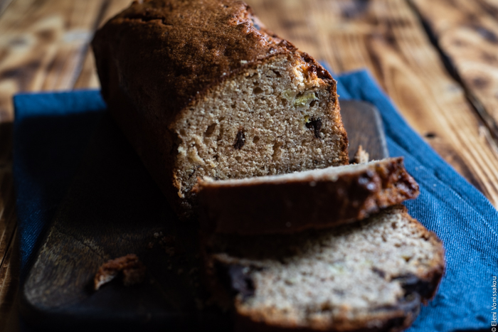 Chocolate Chip Emmer Flour Banana Bread with Tahini www.thefoodiecorner.gr Photo description: A closer view of the inside of the banana bread. Two pieces have been cut and are lying on their side. 