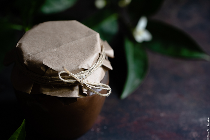 Chocolate Orange Curd – The Easy Way www.thefoodiecorner.gr Photo description: A close view of the top part of a jar with chocolate orange curd, the lid covered with paper and tied with string.