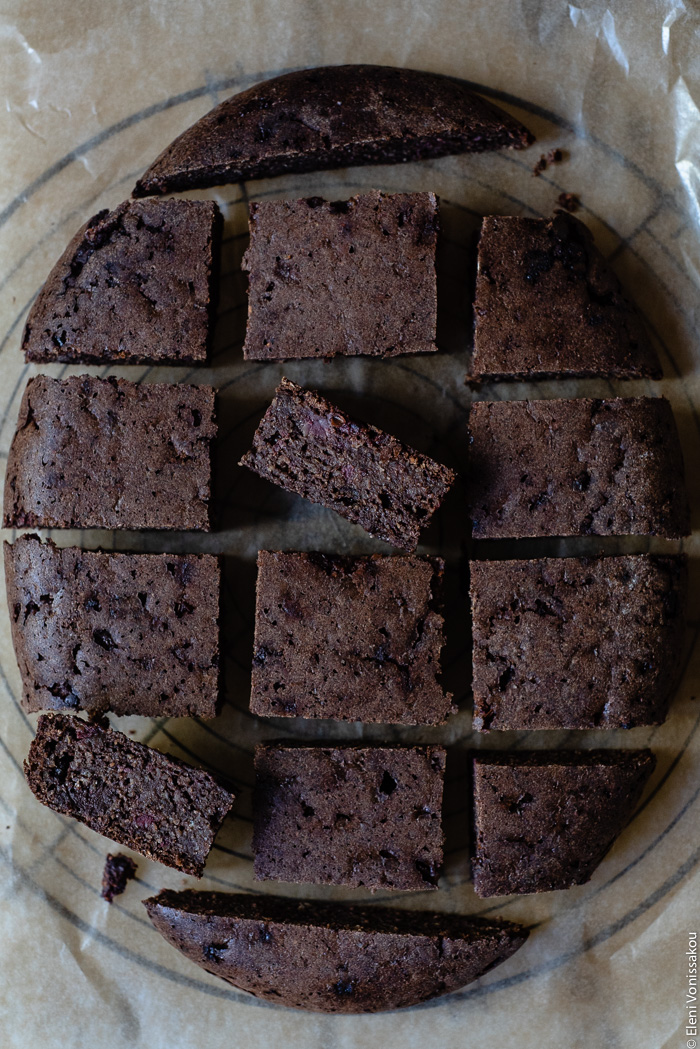 Plant-Based, Date-Sweetened Chocolate Banana Oat Cake-Bars, in the Slow Cooker www.thefoodiecorner.gr Photo description: A close view of Chocolate Banana Oat Cake-Bars cut up and arranged (in the shape of the slow cooker) on a piece of grease-proof paper.